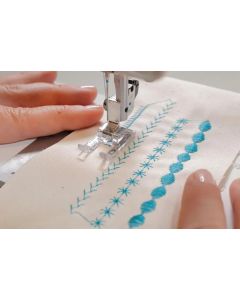 Piedino aperto per punti decorativi pieni - Janome