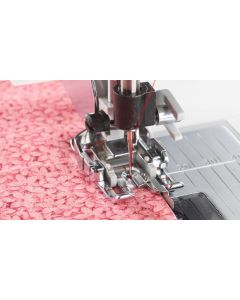 Piedino intercambiabile con guida 1/4" Husqvarna Viking