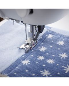 Piedino per quilt da 6 mm con guida a destra Pfaff