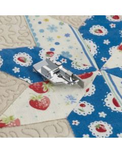 Piedino per patchwork 1/4'' (6,5 mm) con guida