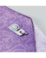 Piedino per orlo roulè / orlo tondo